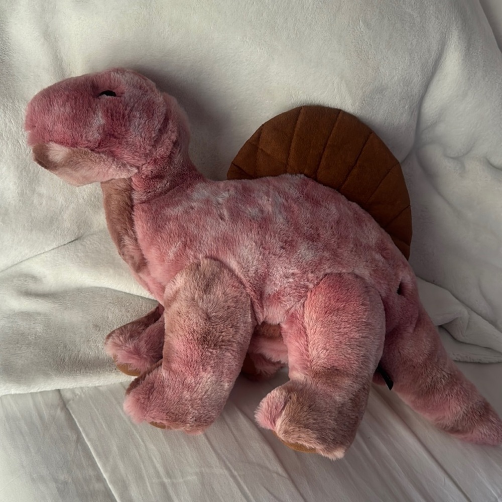 FAO Schwartz plush dinosaur with lights and sounds, great condition, clean cute